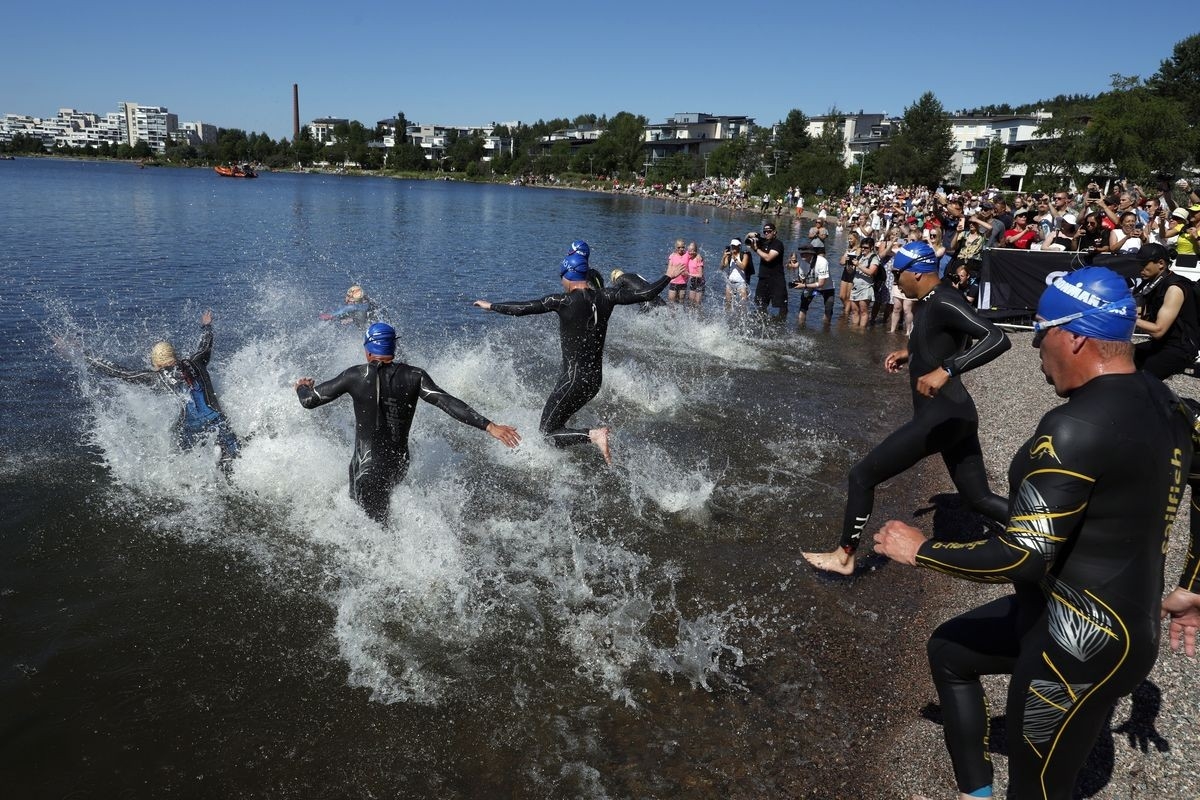 A unique afternoon swim start experience for IRONMAN 70.3 Finland, giving athletes the perfect opportunity to race under the midnight sun. Getty Images for IRONMAN A unique afternoon swim start experience for IRONMAN 70.3 Finland, giving athletes the perfect opportunity to race under the midnight sun. Getty Images for IRONMAN